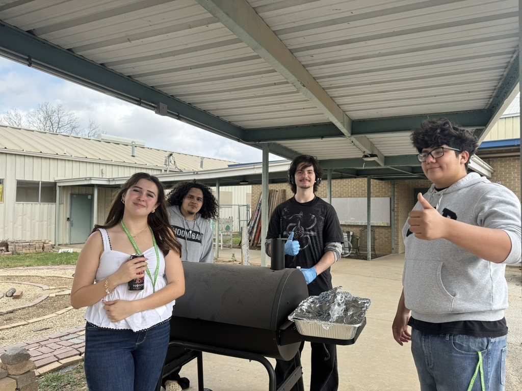 students cooking outside