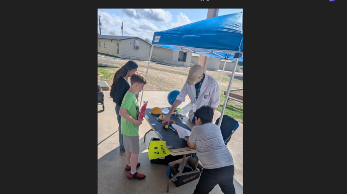 students watching an experiment