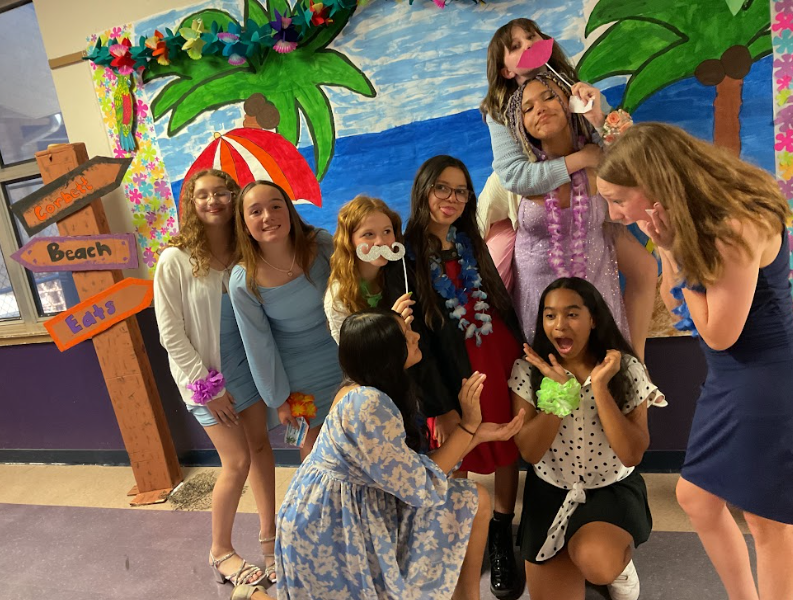 a group of girls being silly for a picture