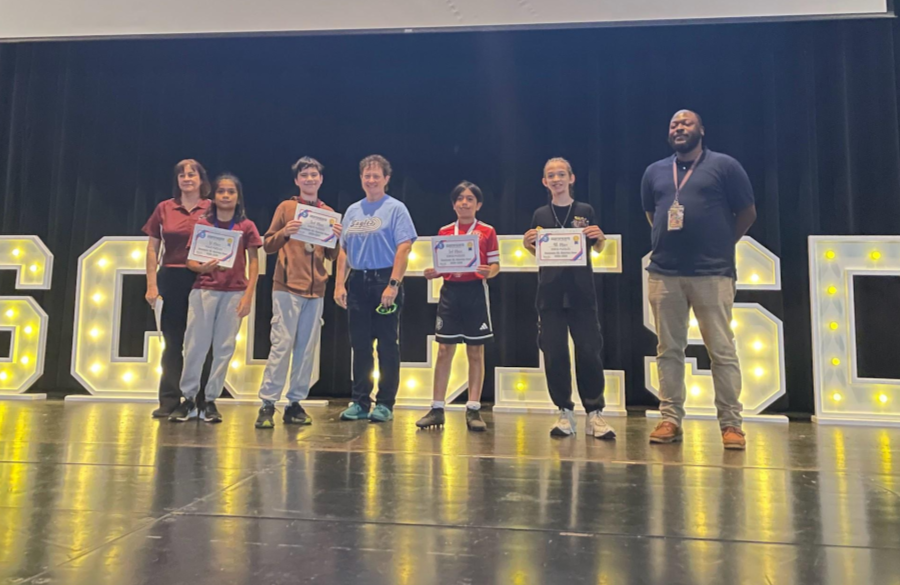 Students who competed in UIL competition posing together 