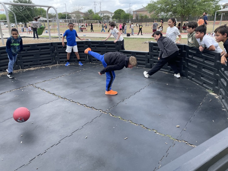 Group of boys playing gaga ball