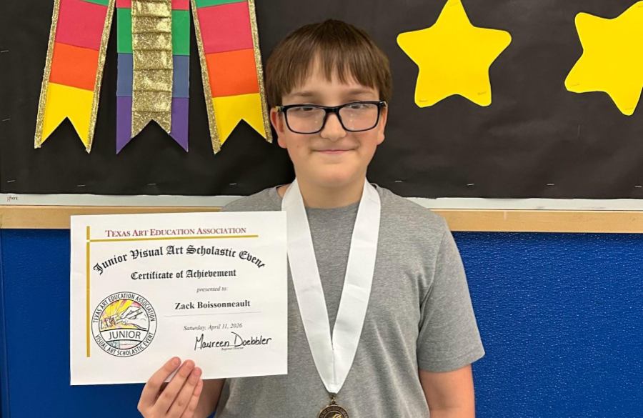 student holding their awarded certificate from the Junior VASE Art Competition 