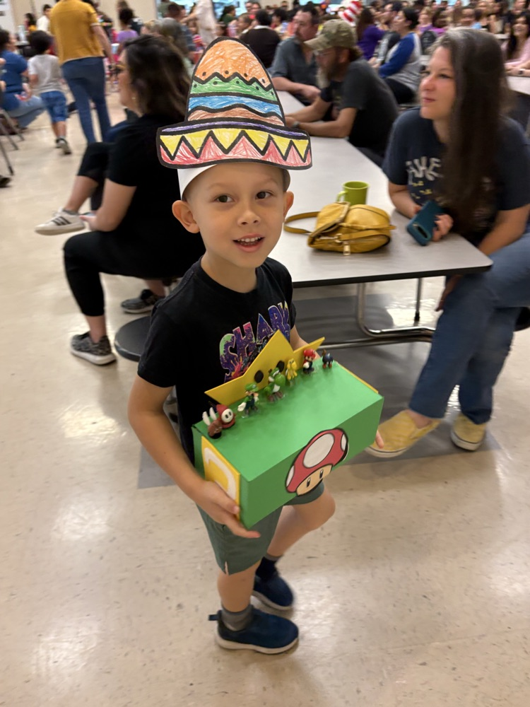 student with fiesta float