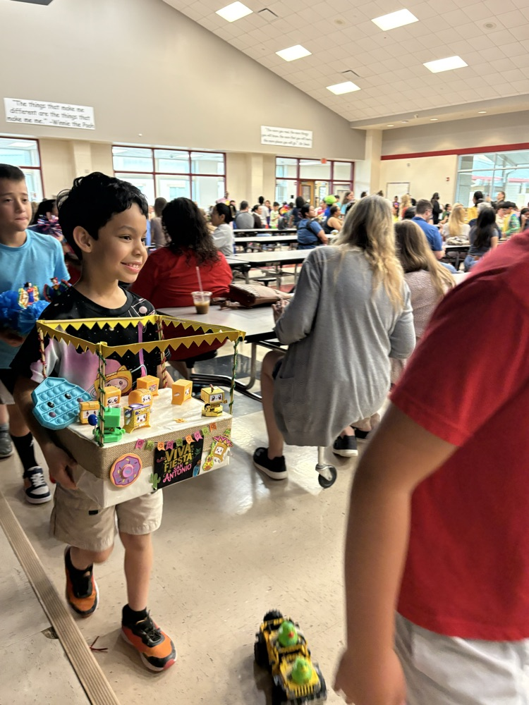 student with fiesta float