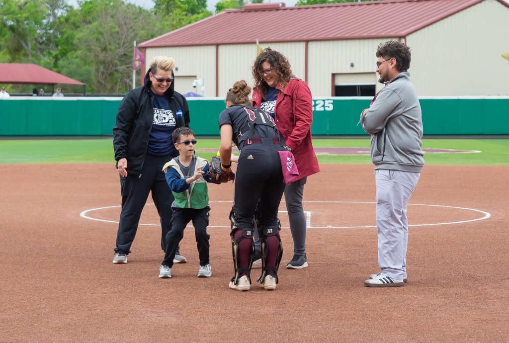 Yates Velebil threw the first pitch at the Texas State softball game