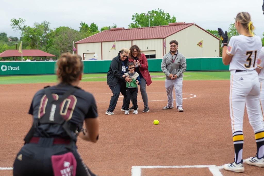 Yates Velebil threw the first pitch at the Texas State softball game