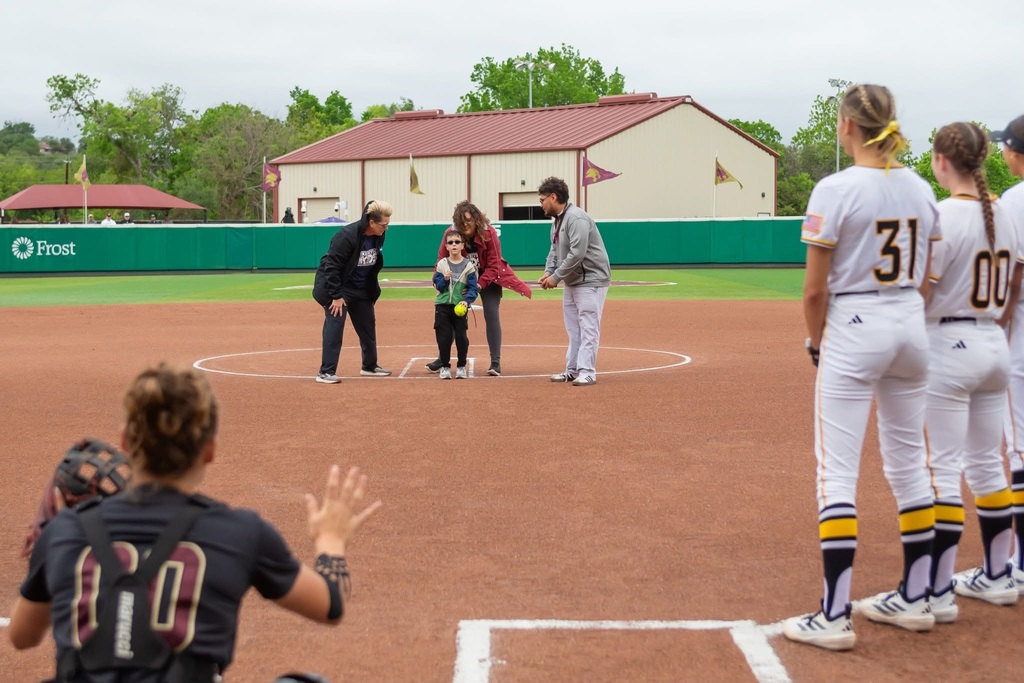 Yates Velebil threw the first pitch at the Texas State softball game