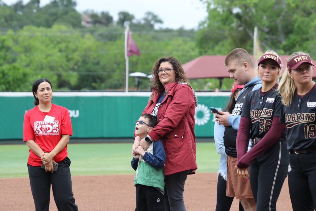Yates Velebil threw the first pitch at the Texas State softball game