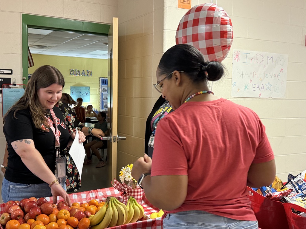Schertz teachers were all smiles going through the food cart filled with fruits, chips and healthy protein bars