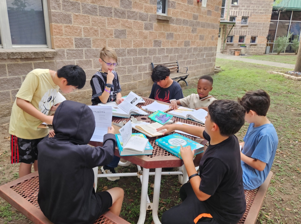 Miss Barrowman's class enjoying a moment to learn outside the classroom