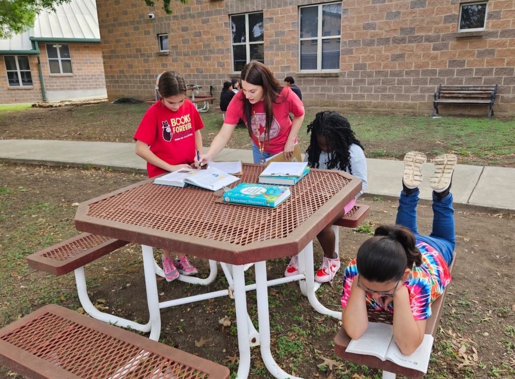 Miss Barrowman's class enjoying a moment to learn outside the classroom
