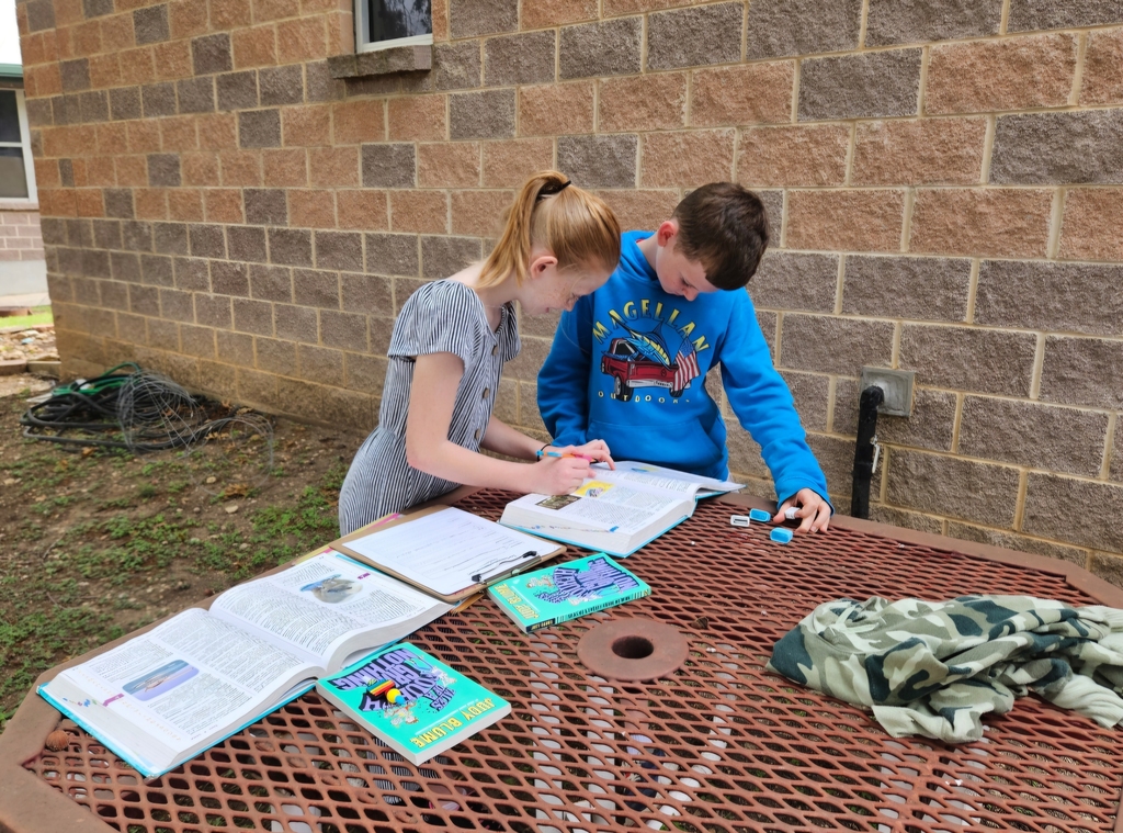 Miss Barrowman's class enjoying a moment to learn outside the classroom