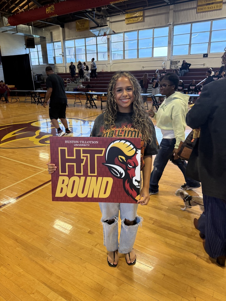 girl holding HT sign