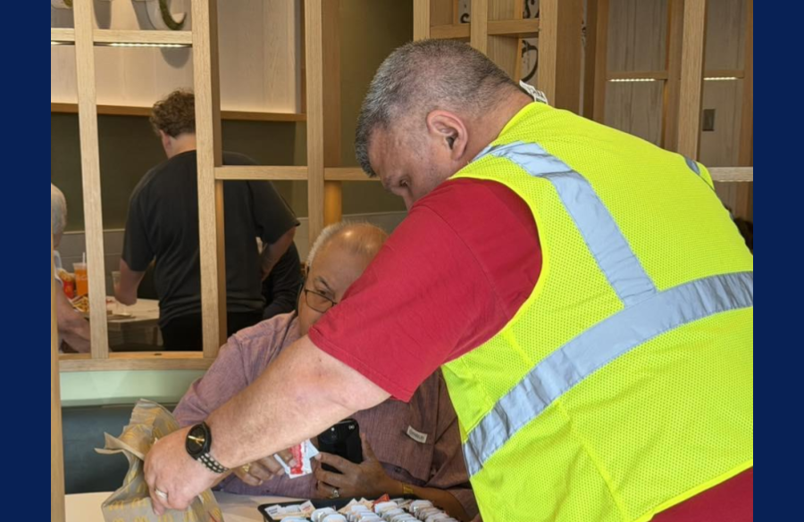 picture of a teacher checking orders at McTeacher Night