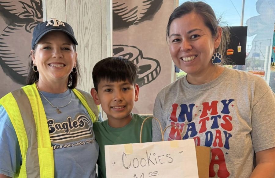 picture of teacher, student, and parent at McTeacher Night