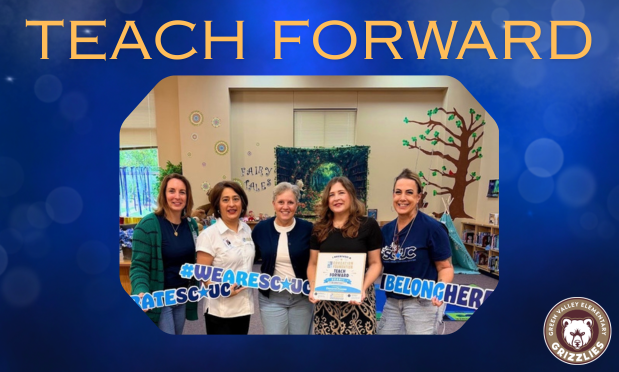 Ms. Ellis, Green Valley Librarian, receiving a Teach Forward Grant. 