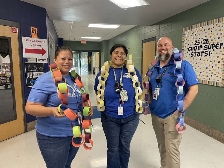 Teachers with Countdown paper chains around their neck