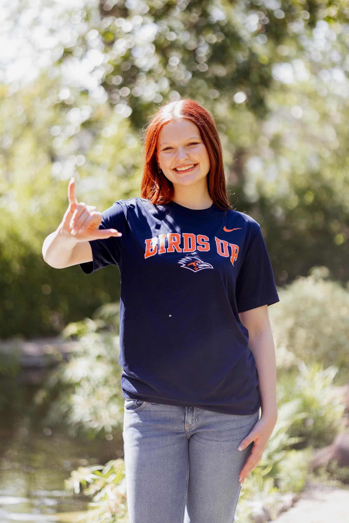 student in UTSA shirt
