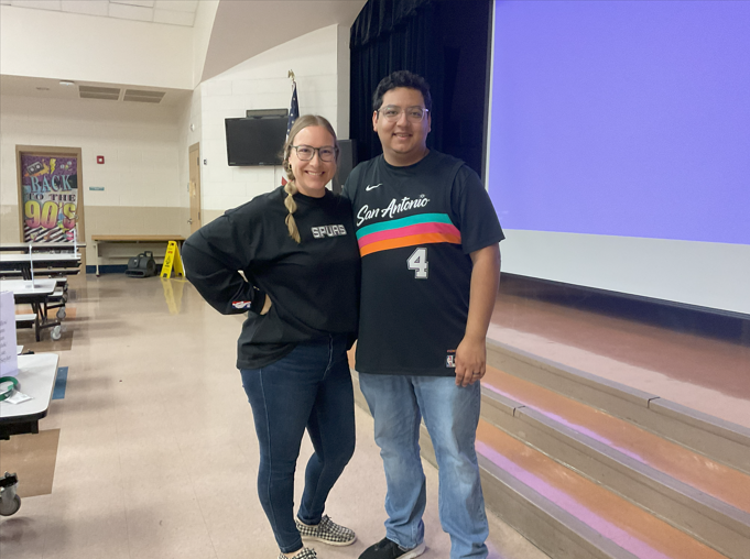 Mrs. Ramos and Mr. De La O wearing spurs shirts