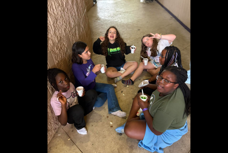 girls eating snow cones
