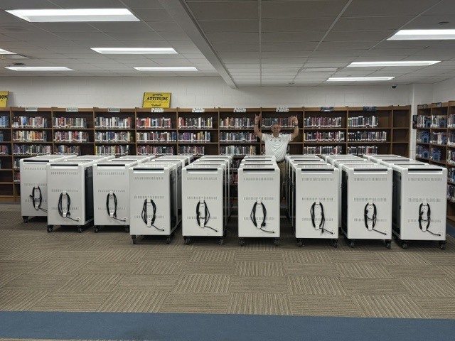 picture of 32 chromecarts with a person standing with Buffs hand sign