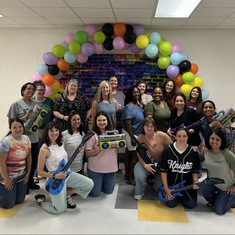 teachers posing for a picture