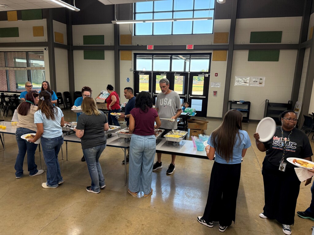 Teachers enjoying Welcome Back breakfast