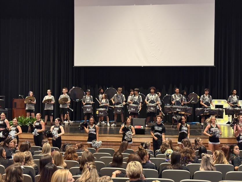 Steele drumline, cheer and dance team