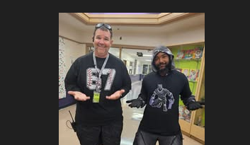 coaches posing with six seven hands