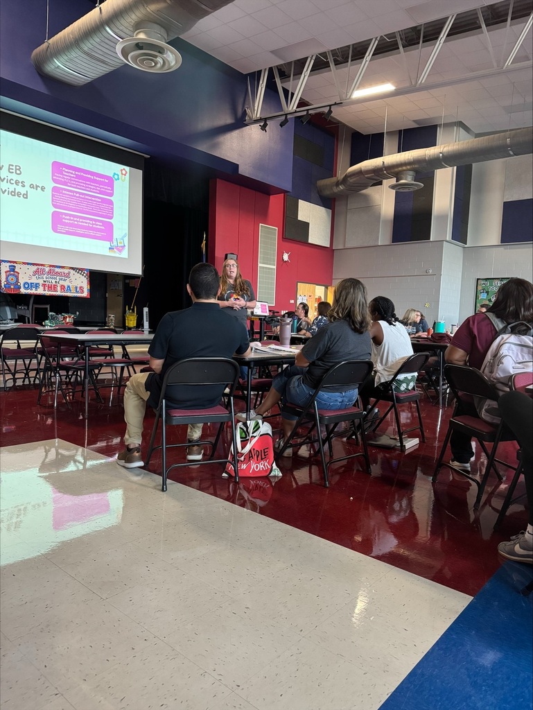 photo of teachers sitting in professional development