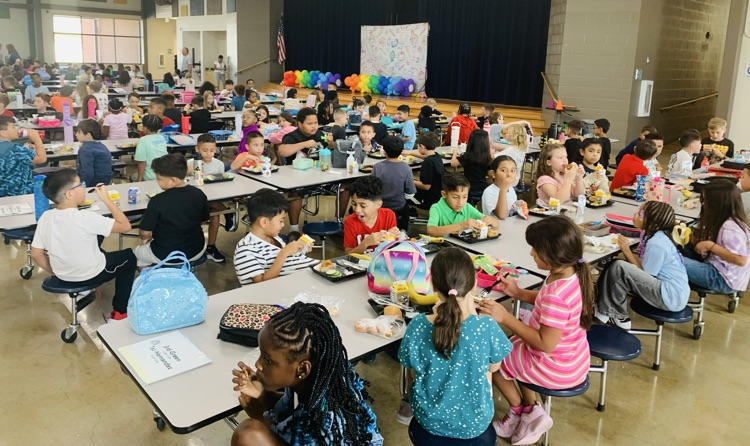 Students sitting in cafeteria