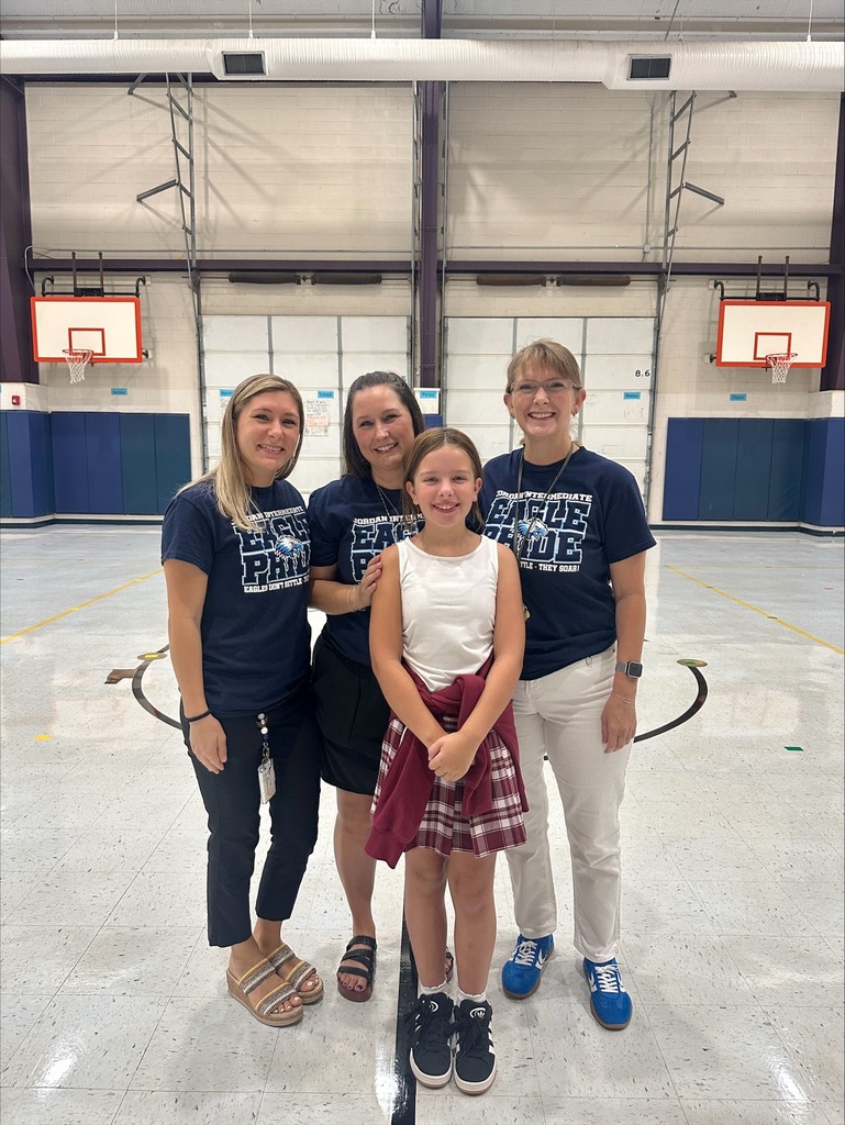 picture of student with teachers