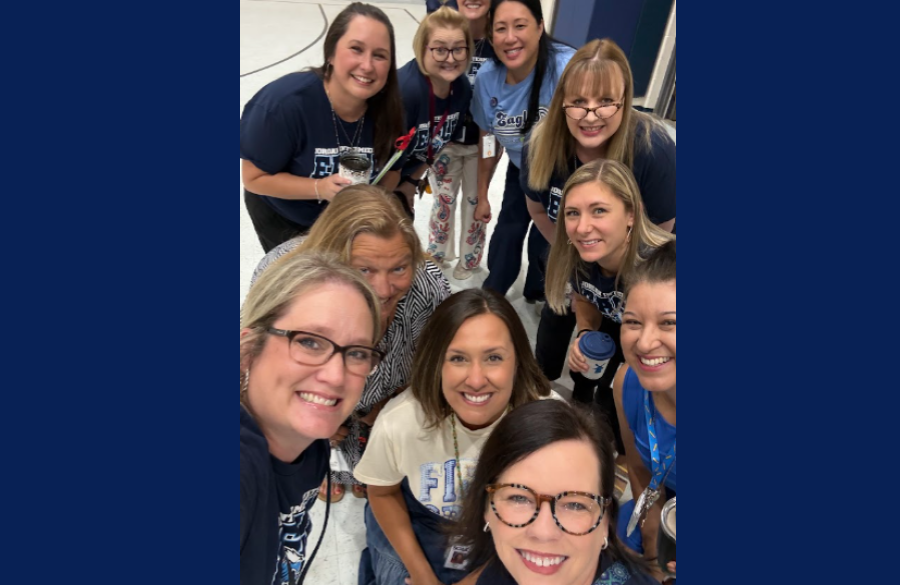 5th grade teachers posing together