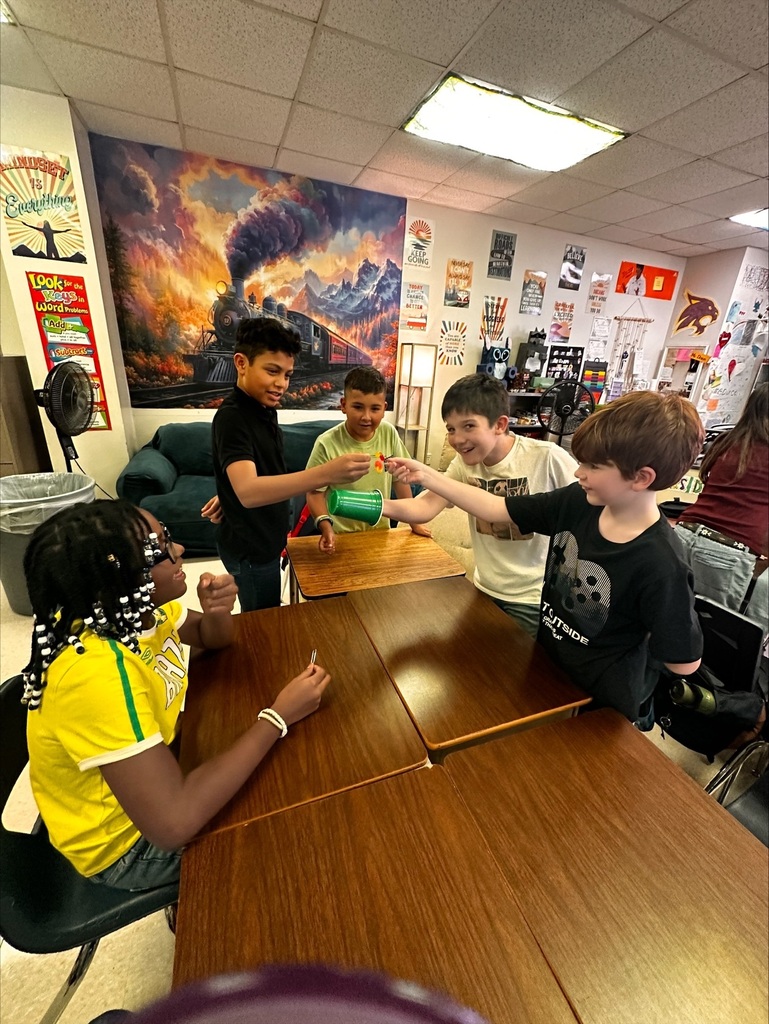 students working together on a team building activity in Ms Dixon's Math class