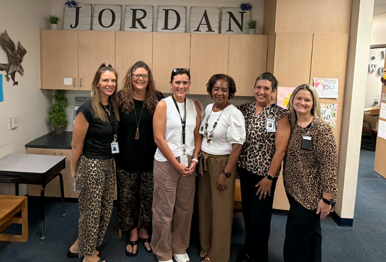 teachers dressed for Wild Wednesday posing together