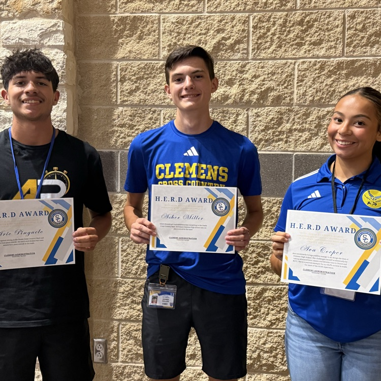 students holding herd awards