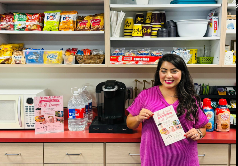 PTC member  putting snacks in the workroom.