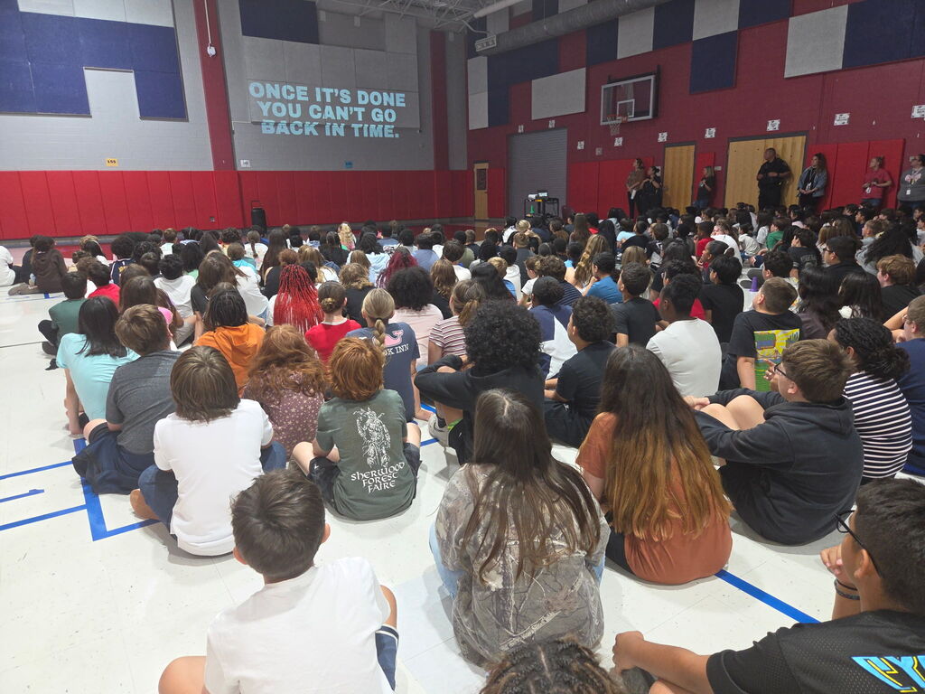 Students sitting in assembly