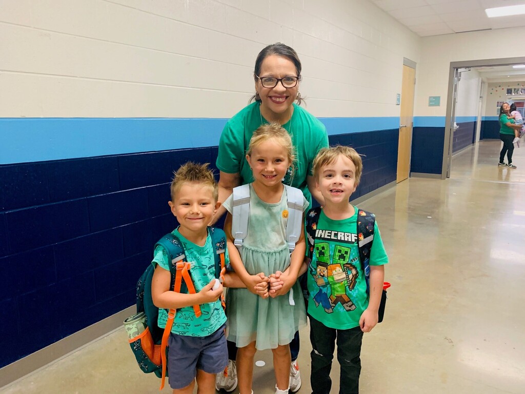 Students wearing green shirts