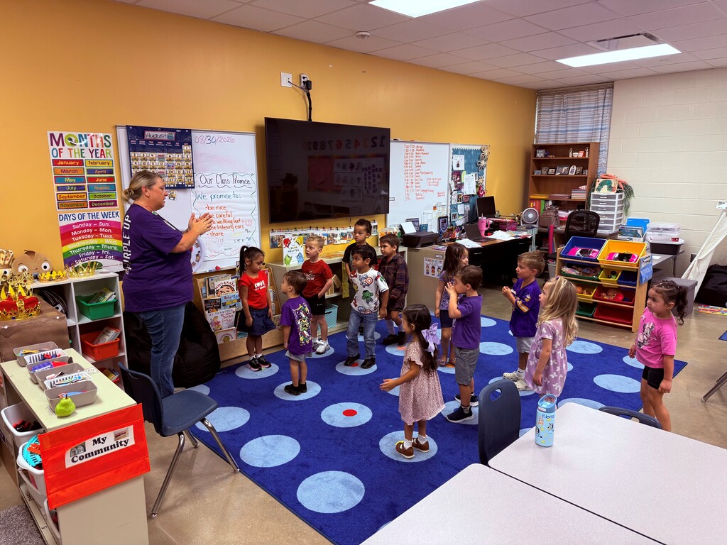 Classroom with students wearing purple.