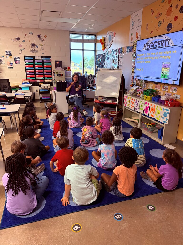 Teacher reading to students