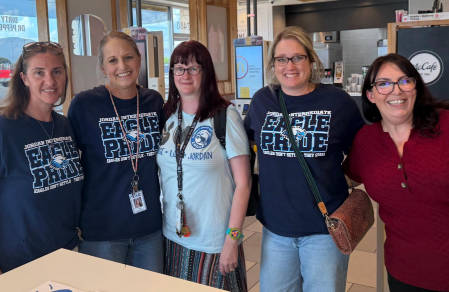 teachers posing together at McTeacher Night