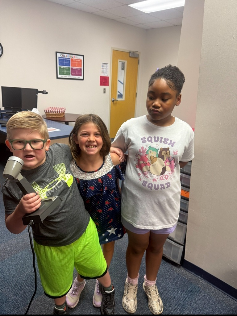 4th graders helping with morning announcements
