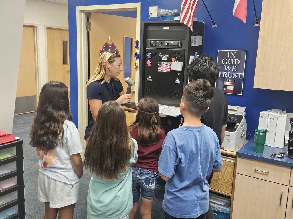 4th graders helping with morning announcements