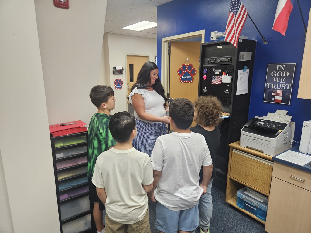 4th graders helping with morning announcements