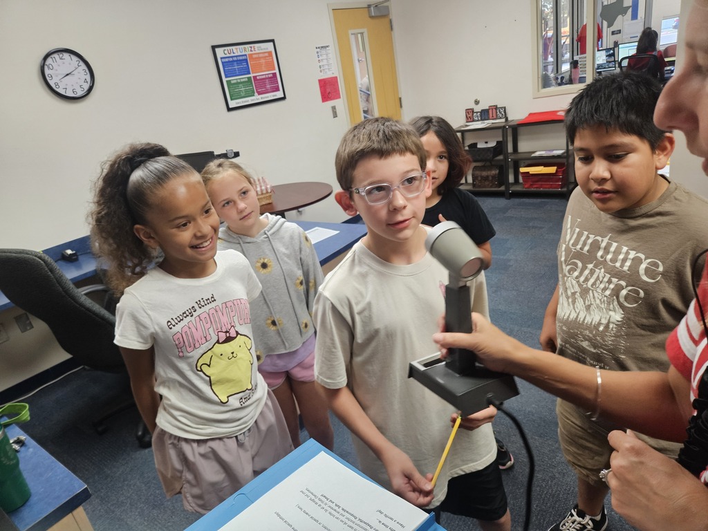 4th graders helping with morning announcements