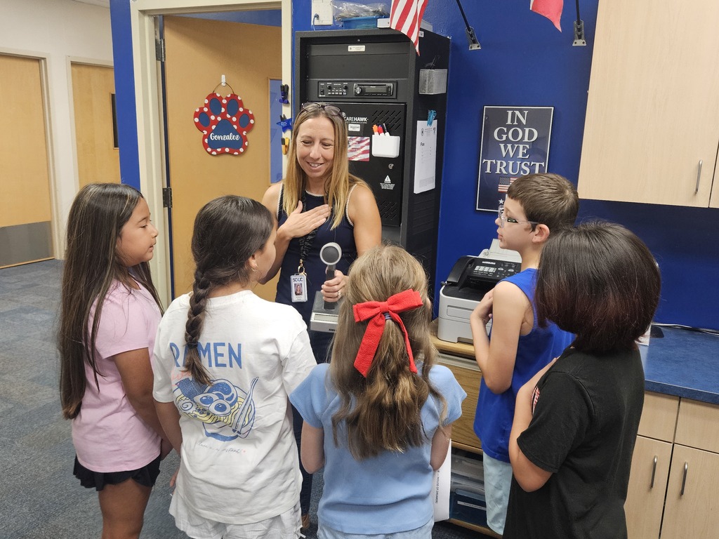 4th graders helping with morning announcements