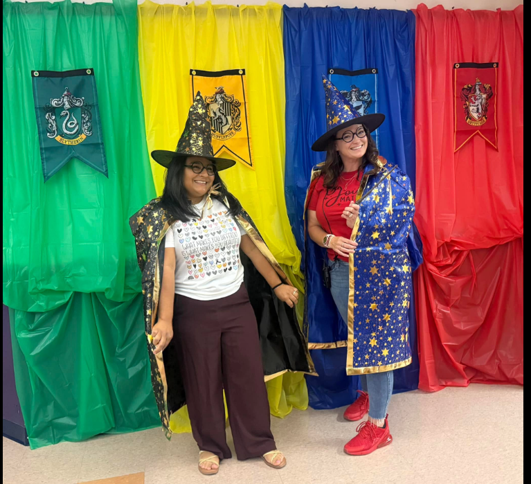 two counselors dressed as wizards