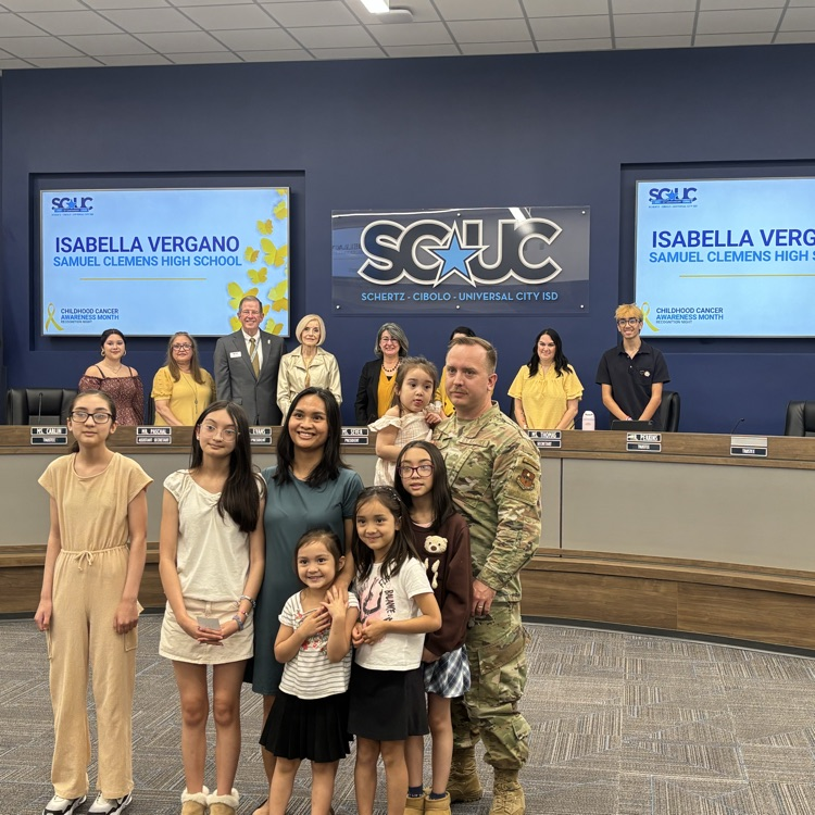 family in front of school board. 