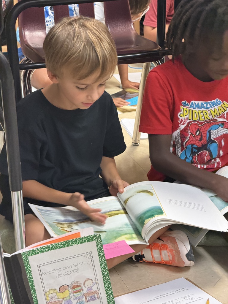 4th graders diving into reading.